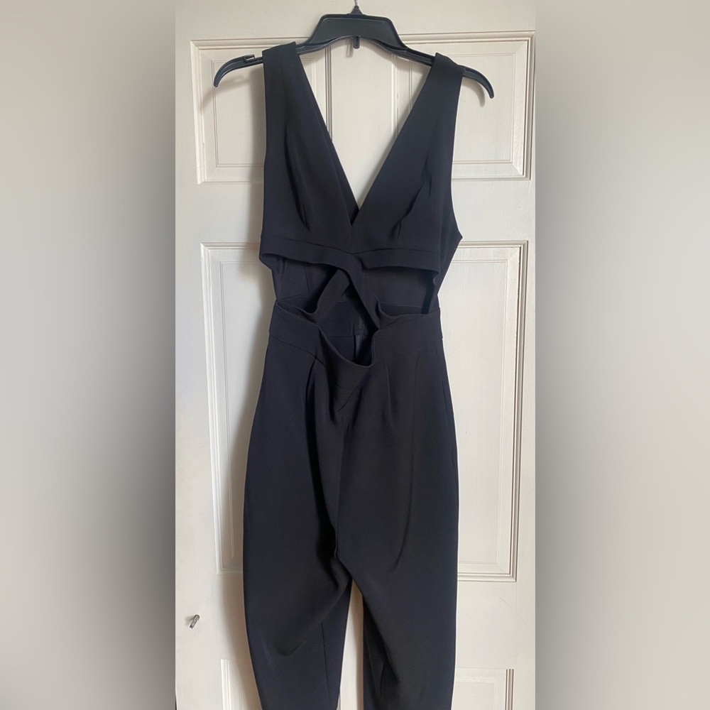 Black Jump Suit from express worn once excellent shape!